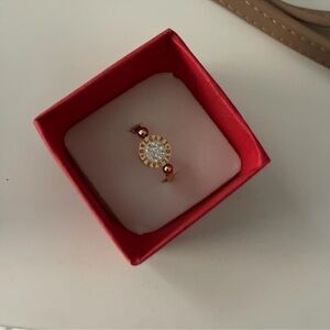 Bulgari Gold and Red Ring with Sparkling Accents